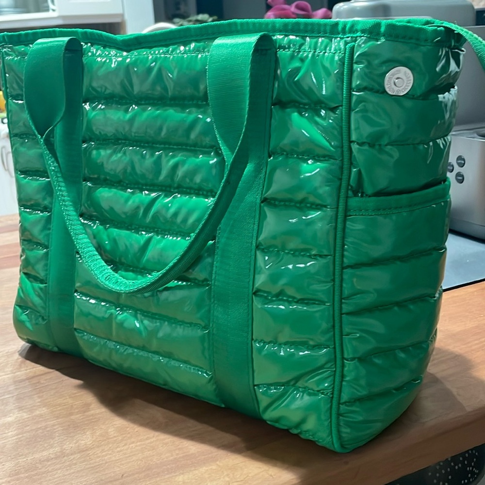 Ah-dorned carry bag
